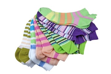 Stack Of Many Pairs Colorful Striped Socks Isolated On White
