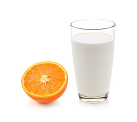 glass of milk with orange isolated on white