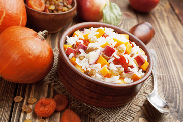Sweet pilaf with pumpkin, apples and dried fruit