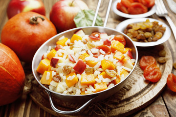 Sweet pilaf with pumpkin, apples and dried fruit
