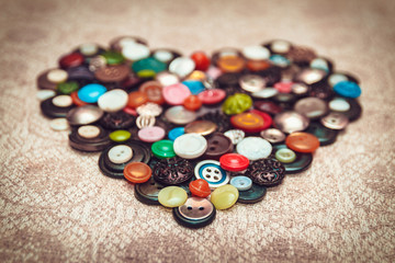 Vintage heart of the buttons on a linen handkerchief