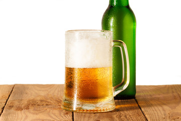 Bottle and glass of beer. Isolated on white background