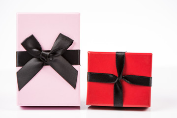 Red and pink gift box on white background isolated