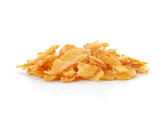 Pile of corn flakes isolated on white.
