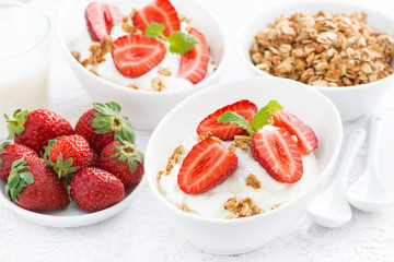 whipped cream with fresh strawberries and granola