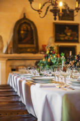 Setout table with tableware in modern restaurant.