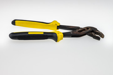 old pliers yellow and black color