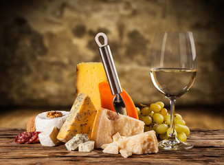 Various kind of cheese with wine
