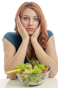 Woman on dieting, eating organic salad, an apple, smoothie
