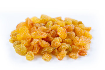Heap of sultana raisins on white background