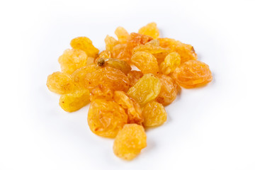 Heap of sultana raisins on white background