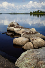 Stone coast of the lake.