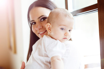 Little baby girl with her mother