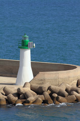 Beacon, pier, sea. Cagliari, Sardinia