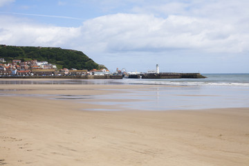 Beach and lighthouse at Scarborough