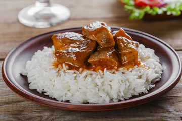 beef stew with white rice and sauce
