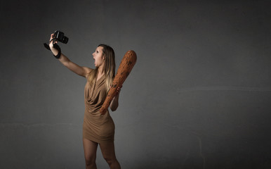 woman taking selfie with camera