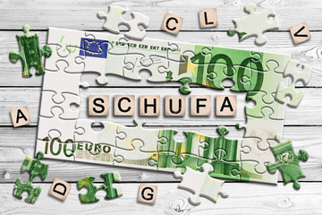 Geldscheinpuzzle - Schufa