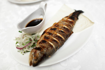 Plate with fried trout