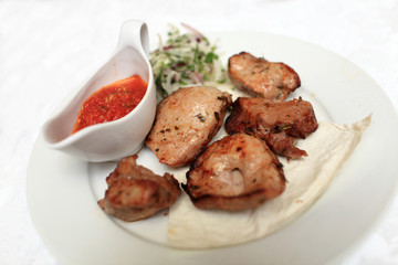 Plate with pieces of kebab