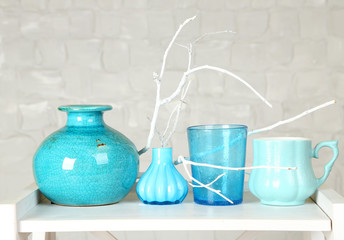 Interior with decorative vases and branch twig