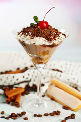 Tasty tiramisu dessert in glass,
