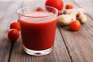 Glass of tomato juice with cherry tomatoes