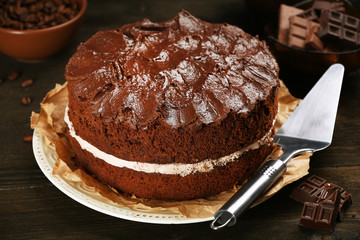 Delicious chocolate cake on table close-up