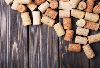 Wine corks on wooden background