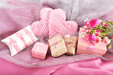 Handmade gifts on Valentine Day, on fabric background