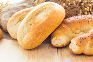 Various bakery products wooden background