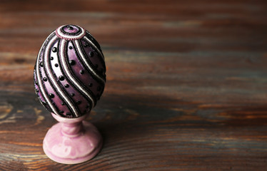 Easter egg on rustic wooden table background