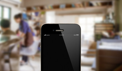 close up smart phone against blur people in cafe background