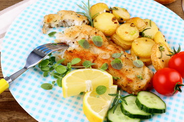 Rosemary potatoes with fried fish fillet