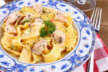 Fish salmon fillet with tagliatelle noodle