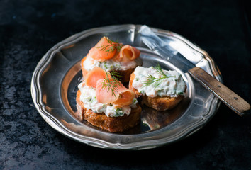 Canapes with smoked salmon and cream cheese spread