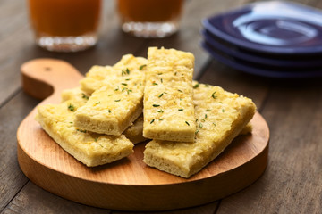 Fresh homemade garlic and cheese sticks with thyme