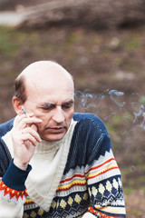 Smoking man. Emotional portrait