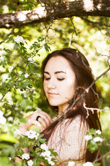 Girl under tree. Portrait of beautiful girl under tree