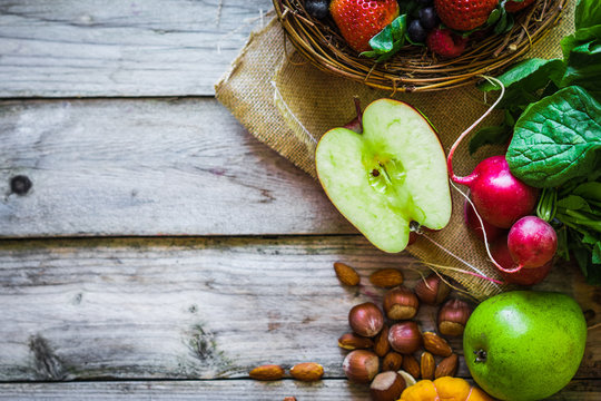 Fruits and vegetables on rustic background