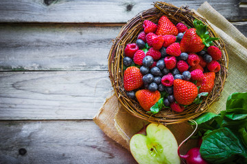 Berries on wooden background