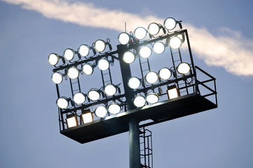 Naklejka premium Stadium lights at sunset