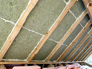 Laying slabs of heat insulation material