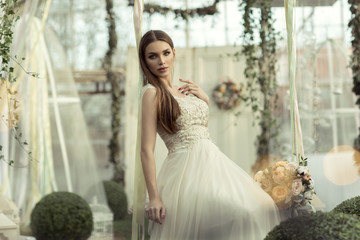 Beautiful natural woman on swing