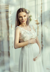 Fototapeta premium Beautiful pregnant woman