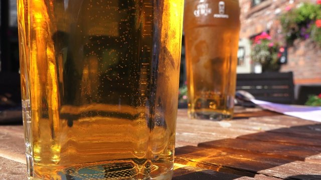 4k 2 pint glasses summer day, british pub culture