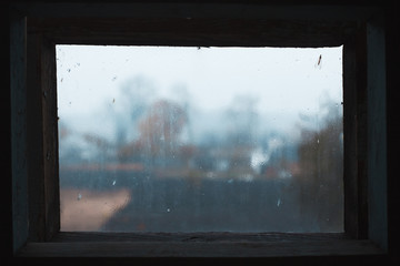 Rain drops on glass in frame