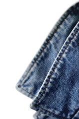 Denim indigo blue jeans jacket collar, isolated macro closeup