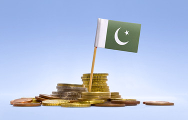 Flag of Pakistan in a stack of coins.(series)