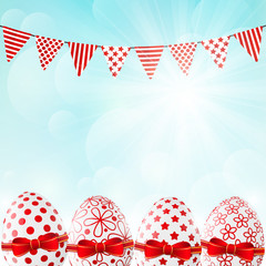Obraz premium Easter eggs on sunny background
